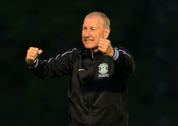 Hibernian manager Terry Butcher celebrates the win. Picture: Getty