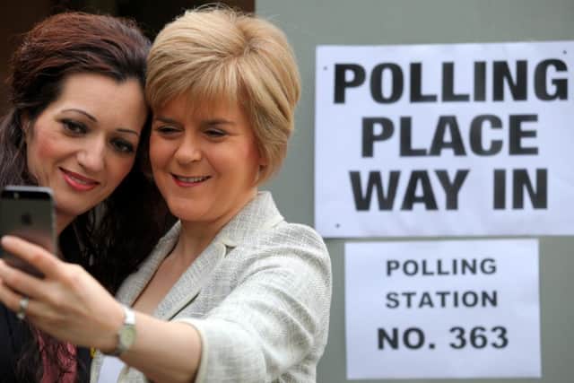 Tasmina Ahmed-Sheikh and Nicola Sturgeon pose for a selfie after voting. Picture: Hemedia