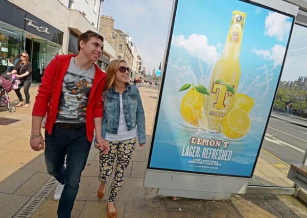 Commuters on Edinburgh's Princes Street were treated to the fresh scent of lemons courtesy of Lemon T, a new citrus beer from Tennent's. Picture: Phil Wilkinson
