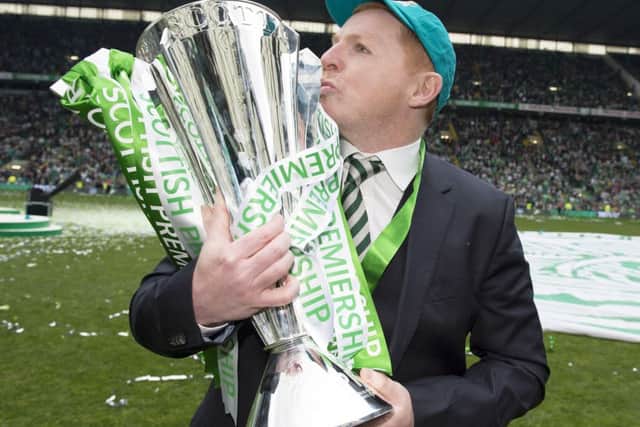 Manager Neil Lennon has kissed goodbye to Celtic after clinching a hat-trick of Scottish title triumphs. Picture: SNS