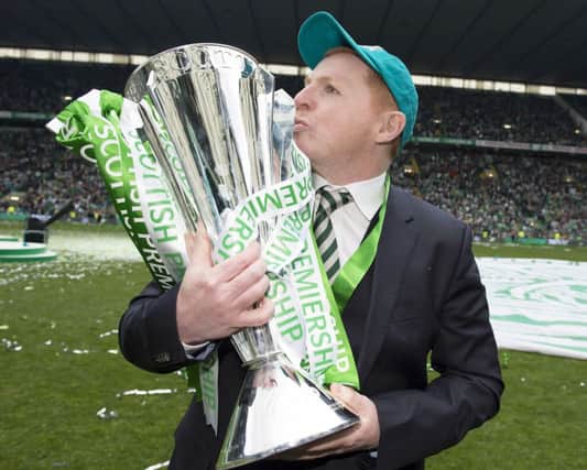 Manager Neil Lennon has kissed goodbye to Celtic after clinching a hat-trick of Scottish title triumphs. Picture: SNS