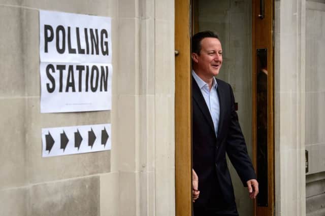 David Cameron leaves Westminster Methodist Hall in central London, after voting yesterday. Picture: AFP/Getty