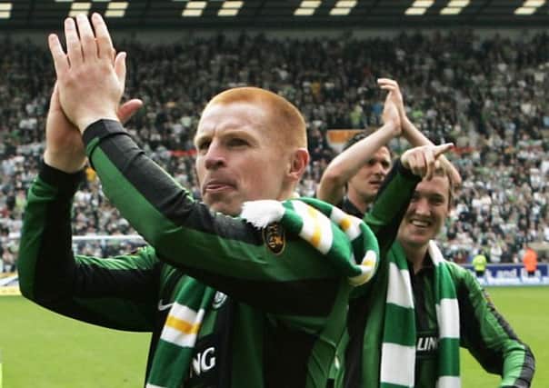 Neil Lennon, left, celebrates winnig the 2006/07 title with Aiden McGeady, right. Picture: David Moir