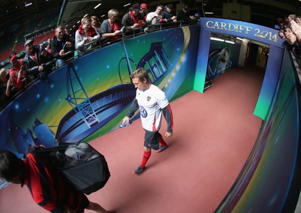 The Toulon captain Jonny Wilkinson walks down the tunnel for kicking practice. Picture: Getty