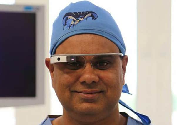 Shafi Ahmed has become the first surgeon in the UK to broadcast online a live surgical procedure using Google Glass. Picture: PA