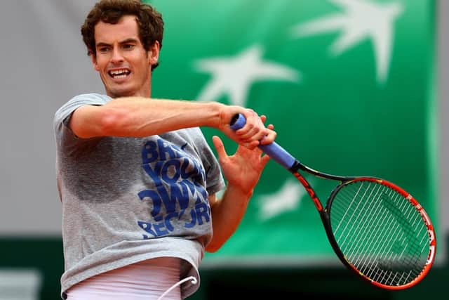 Andy Murray gets a feel for the clay of Roland Garros. Pictures: Getty