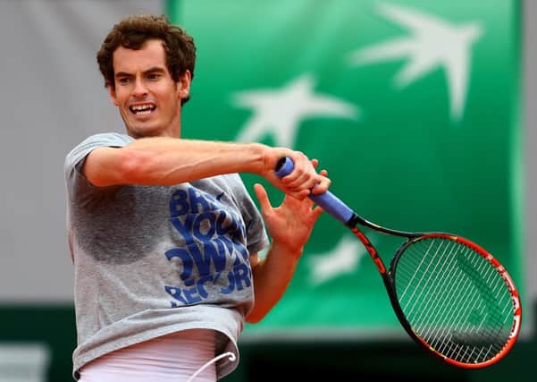 Andy Murray gets a feel for the clay of Roland Garros. Pictures: Getty
