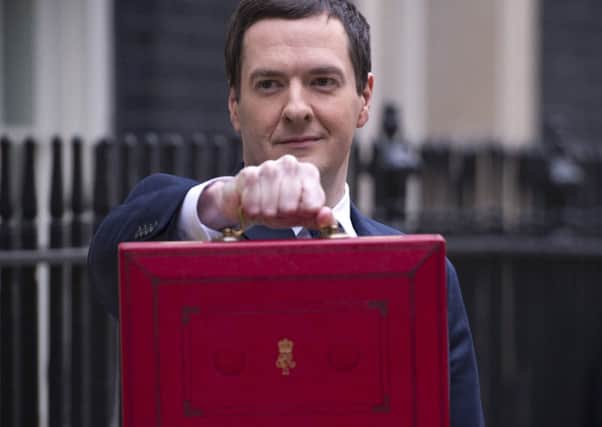 Scammers are exploiting pension changes planned by George Osborne. Picture: Getty