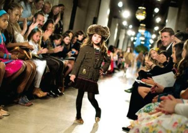 The audience applauds one of the miniature creations. Picture: Danny Kim/NYT