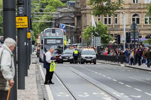 An Edinburgh tram breaks down on Princes Street. Picture: Malcolm McCurrach