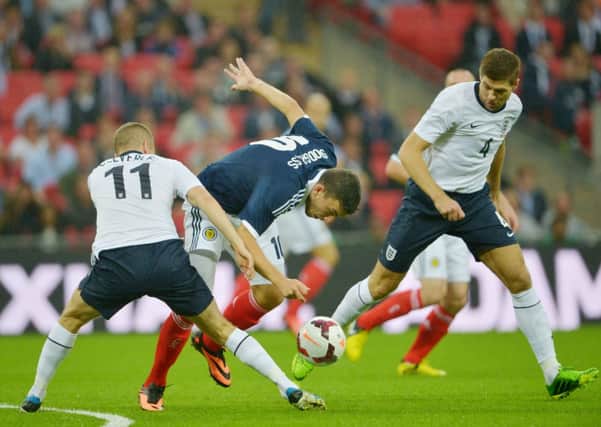 Scotland take on England in last years friendly at Wembly. Picture: TSPL