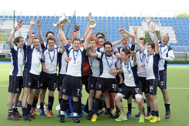 The Grange players celebrate after winning the Scottish Cup at Glasgow Green. Picture: TSPL