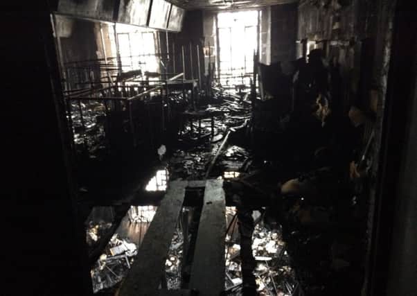 The destruction to the interior of the Mackintosh Building caused by the fire. Picture: SFRS/PA