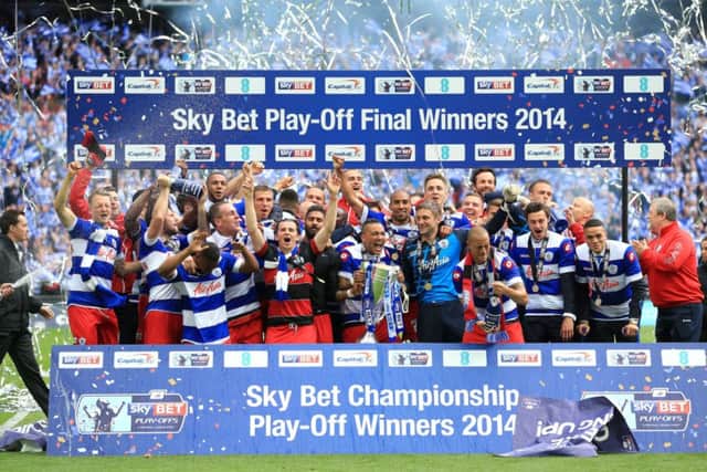 Victorious QPR celebrate after their play-off final victory over Derby County on Saturday. Picture: PA