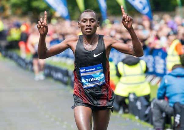 Kenyas David Toniok races to the finish line in yesterdays Edinburgh Marathon. Picture: Ian Georgeson