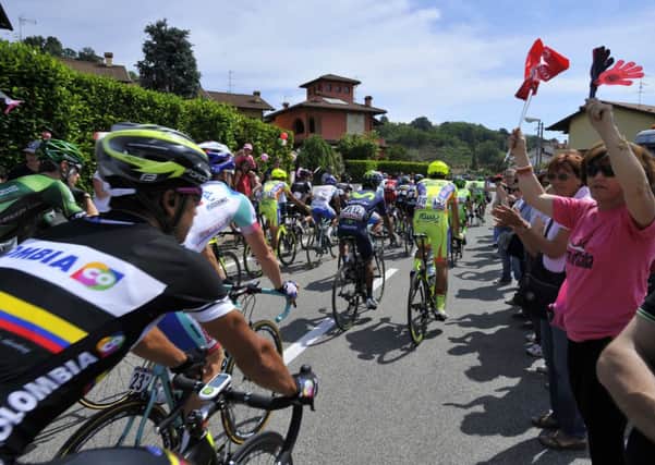 Spectators line the route at the start of the 15th stage of the Giro dItalia. Picture: AP