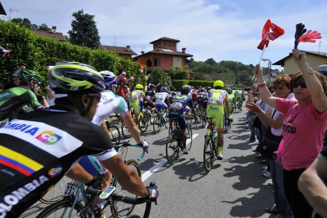 Spectators line the route at the start of the 15th stage of the Giro dItalia. Picture: AP