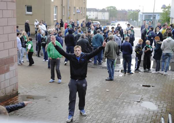 Angry Hibs fans vented their anger after the final whistle. Picture: Greg Macvean