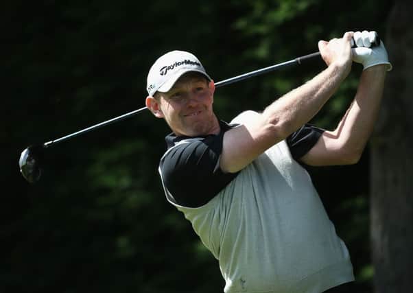 Stephen Gallacher tees off on the 18th hole during day four at Wentworth. Picture: Getty