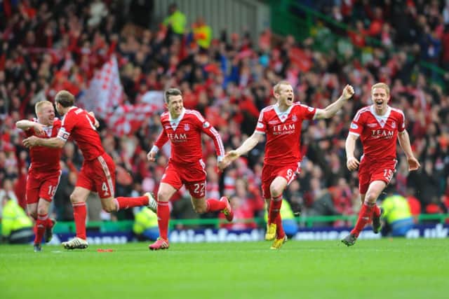 Aberdeen celebrate winning the League Cup. Picture: Robert Perry