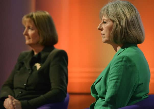 Deputy Labour leader Harriet Harman and Home Secretary Theresa May. Picture: PA