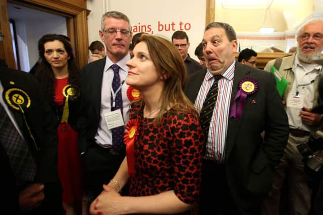 A surprised David Coburn of Ukip joins Labour MEPs Catherine Stihler and David Martin at the election declaration. Picture: PA