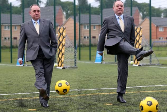 Alex Salmond shows off his ball skills at Fernhill community centre. Pictures: Hemedia