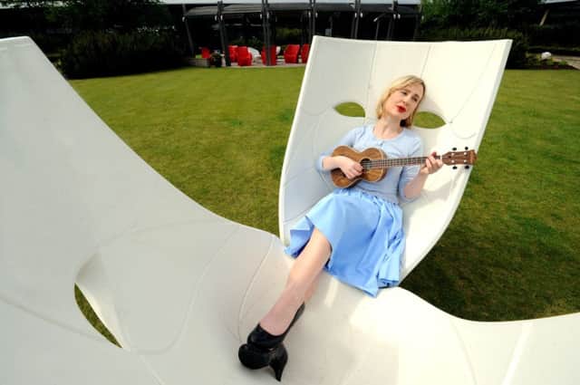 Louise Quinn strums up some publicity yesterday for the Made in Scotland programme. Picture: Lisa Ferguson