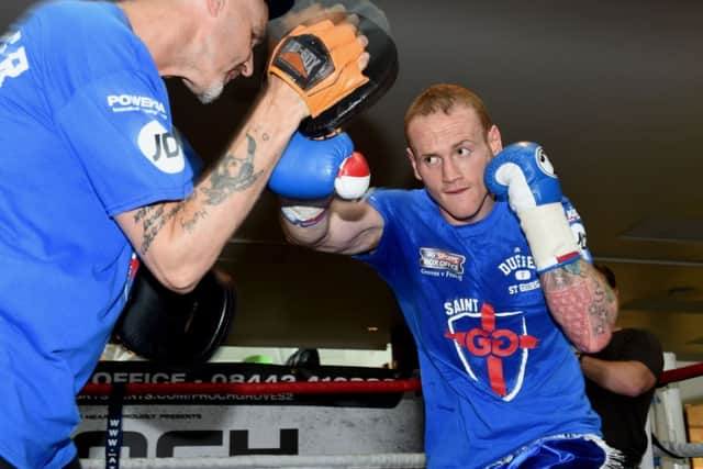 George Groves works out in London yesterday ahead of Saturdays world title rematch with champion Carl Froch. Picture: PA