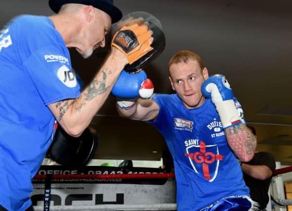George Groves works out in London yesterday ahead of Saturdays world title rematch with champion Carl Froch. Picture: PA