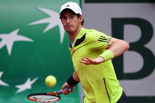 Andy Murray returns a shot during his men's singles match against Andrey Golubev. Picture: Getty