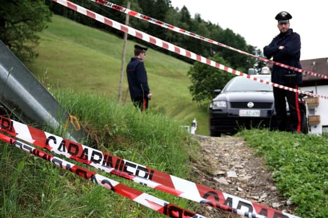 Police officers block the site in northern Italy where the accident, at the Mercedessponsored event, took place. Picture: Getty