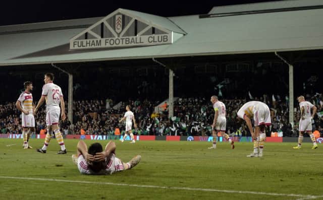 Gordon Greer lies with head in hands after his late defensive blunder led to Nigerias equaliser. Picture: PA