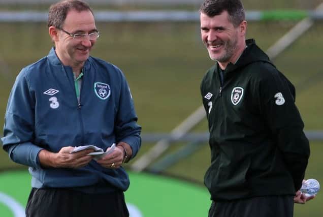 Martin O'Neill, left, shares a joke with Roy Keane, who has held talks with Celtic over the managerial position. Picture: PA