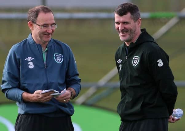 Martin O'Neill, left, shares a joke with Roy Keane, who has held talks with Celtic over the managerial position. Picture: PA