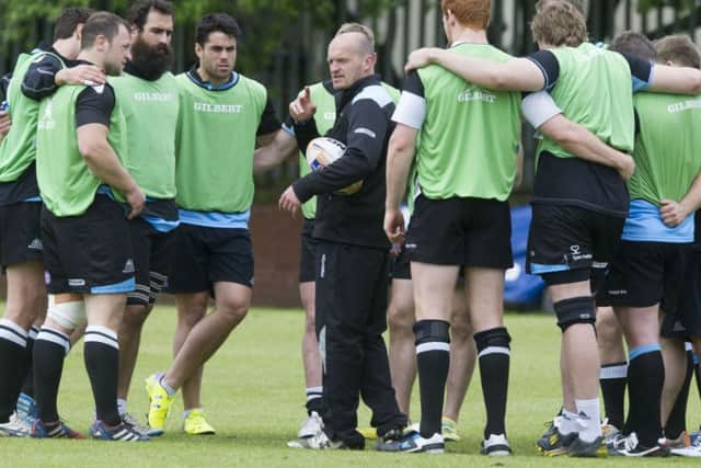 Gregor Townsend gives instructions to his players at training this week. Picture: SNS