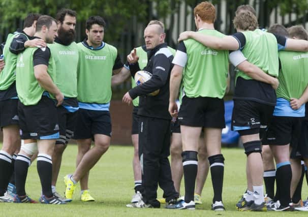 Gregor Townsend gives instructions to his players at training this week. Picture: SNS