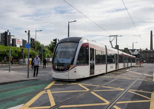 An Edinburgh tram passes Haymarket. Picture: Ian Georgeson