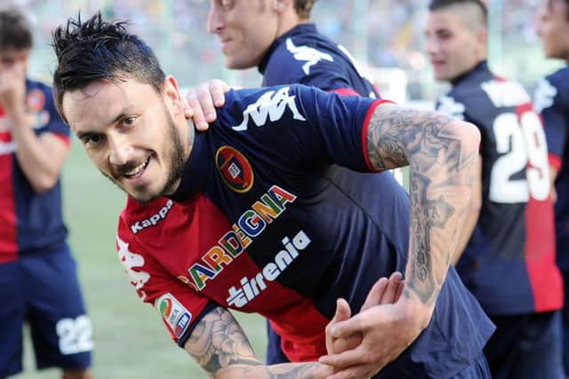 Mauricio Pinilla, formerly of Hearts, celebrates a goal for Cagliari. Picture: Getty