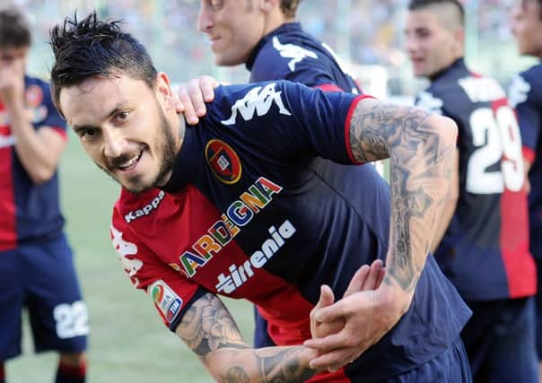 Mauricio Pinilla, formerly of Hearts, celebrates a goal for Cagliari. Picture: Getty