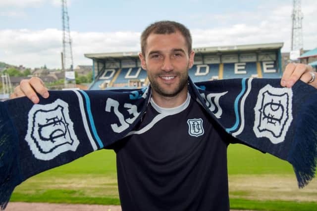 Kevin Thomson is all smiles after signing for Dundee. Picture: SNS