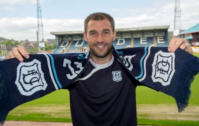 Kevin Thomson is all smiles after signing for Dundee. Picture: SNS