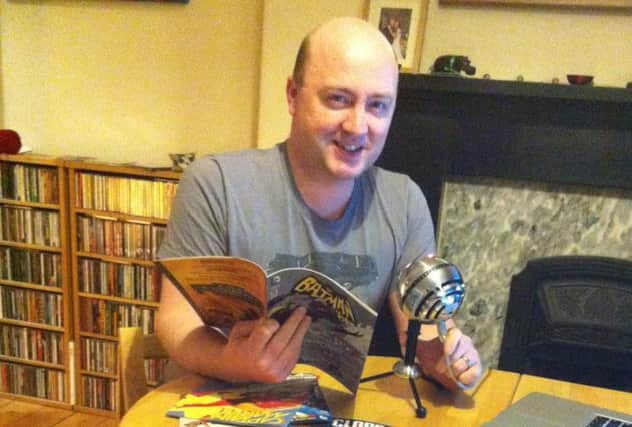 Al Kennedy with his comics and podcast gear. Picture: Contributed