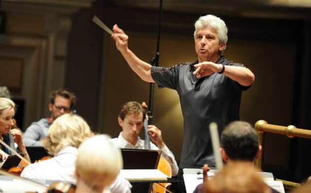 Conductor Peter Oundjian brings the orchestra into line. Picture: Jane Barlow