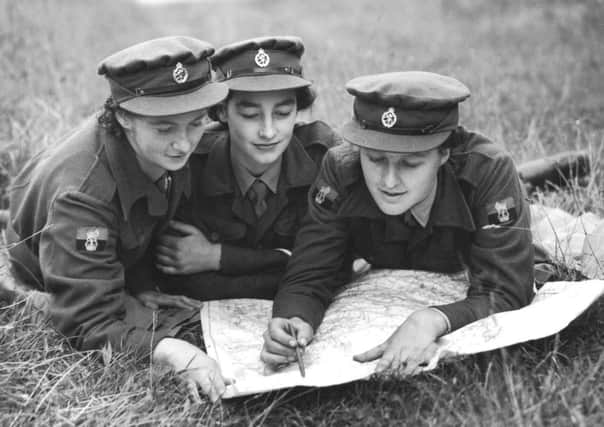 Three young women attend the first WRAF (Women's Royal Air Force) training camp in 1950. Picture: Getty
