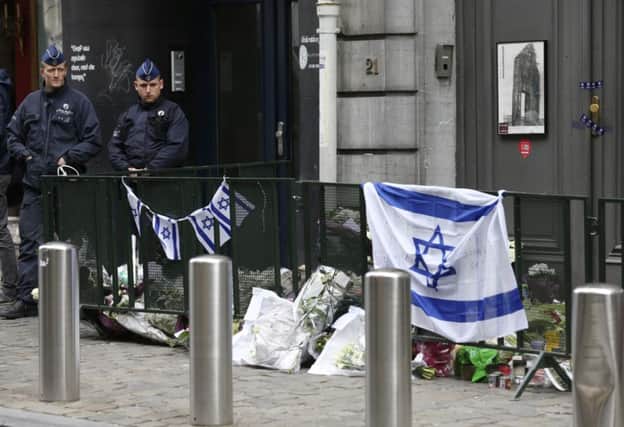 Floral tributes outside the Brussels museum where the shootings took place. Picture: Reuters