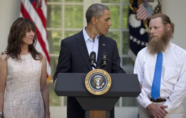 Parents Jani and Bob Bergdahl with President Barack Obama. Picture: AP