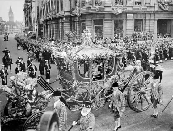 The Queen arrives in Trafalgar Square on this day in 1953. She was crowned in Westminster Abbey later that afternoon. Picture: Getty