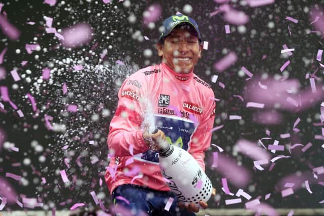 Nairo Quintana sprays the champagne after his Giro dItalia victory yesterday. Picture: Getty