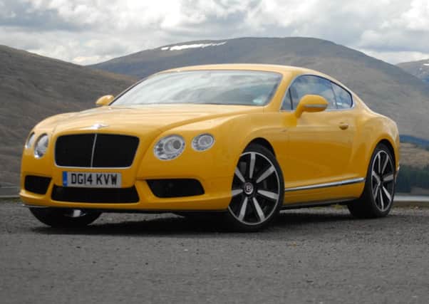 Quite who is in 
the market for a 
bright yellow Bentley, 
I cant be certain